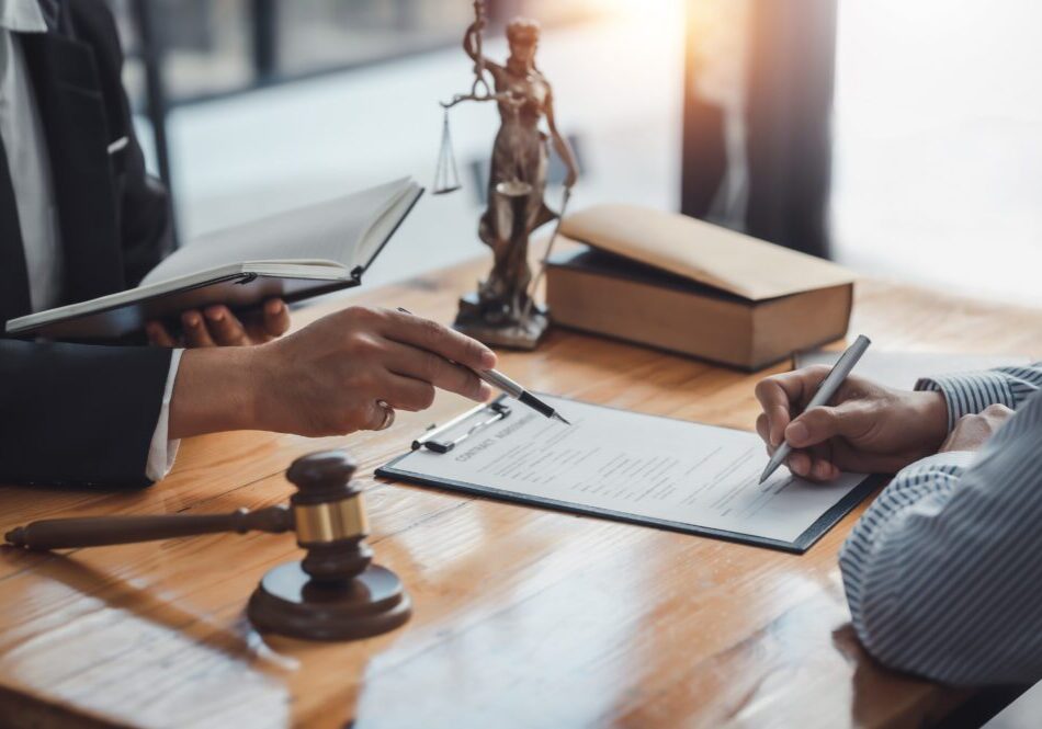 Legal consultation with documents and gavel.